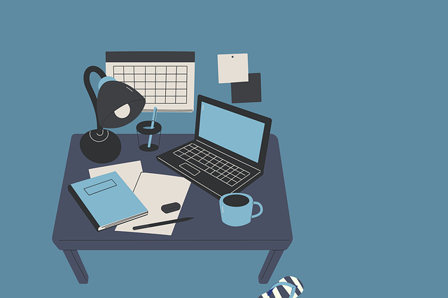 Modern home office setup in 2025 featuring a laptop, calendar, and coffee mug to boost productivity in remote workspaces.
